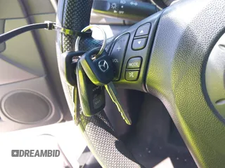 2008 Mazda 3 i Sport with VIN JM1BK32F881775903, listed as a IAAI auction lot 41878314 with 128,232 mi miles and . Bid and sale history available at DreamBid. Image 11.