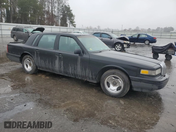 1997 Lincoln Town Car Executive z VIN 1LNLM81W7VY720905, wystawiony jako Copart lot #85910534 z przebiegiem Nie podano mil oraz Szkoda całkowita • Salvage title. Historia ofert i sprzedaży dostępna na DreamBid. Obrazek 4.