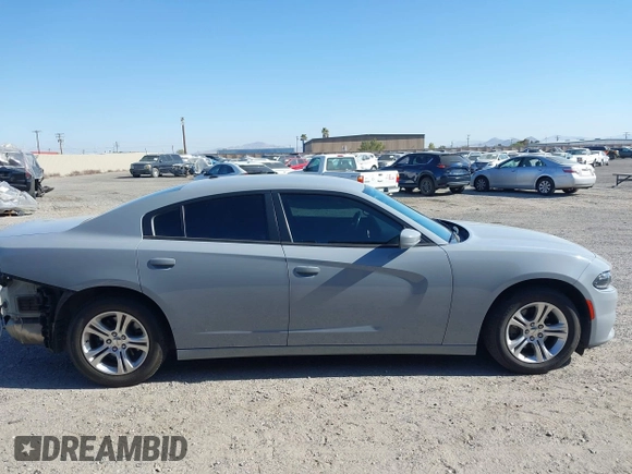 2020 Dodge Charger SXT z VIN 2C3CDXBG5LH194484, wystawiony jako IAAI lot #42121474 z przebiegiem 82 897 mil mil oraz . Historia ofert i sprzedaży dostępna na DreamBid. Obrazek 14.