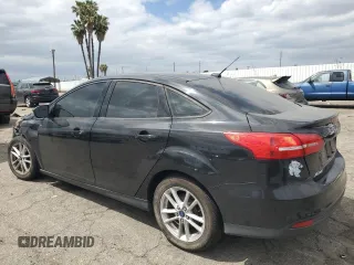 2015 Ford Focus SE with VIN 1FADP3F20FL249872, listed as a Copart auction lot 53506885 with 97,078 mi miles and Salvage title. Bid and sale history available at DreamBid. Image 2.