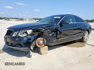 2011 Mercedes-Benz E 350 with VIN WDDKJ5GBXBF067186, listed as a Copart auction lot 57873945 with 129,286 mi miles and Salvage title. Bid and sale history available at DreamBid. Image 1.