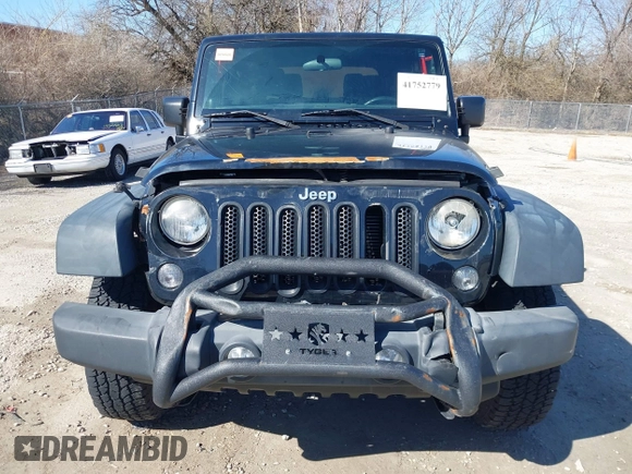 2014 Jeep Wrangler Sport with VIN 1C4AJWAGXEL319749, listed as a IAAI auction lot 41752779 with 140,045 mi miles and . Bid and sale history available at DreamBid. Image 12.