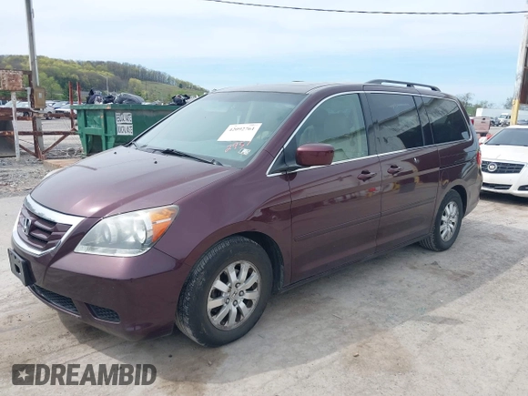 2008 Honda Odyssey EX-L with VIN 5FNRL38748B402957, listed as a IAAI auction lot 42092761 with 142,927 mi miles. Bid and sale history available at carsss.com. Image 2.