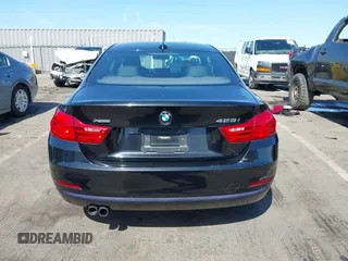 2014 BMW 4 Series 428i xDrive with VIN WBA3N9C53EK244907, listed as a IAAI auction lot 42380025 with 71,431 mi miles and . Bid and sale history available at DreamBid. Image 16.