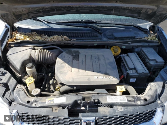 2014 Dodge Grand Caravan American Value with VIN 2C4RDGBG2ER361449, listed as a Copart auction lot 54940615 with 85,012 mi miles and Salvage Title. Bid and sale history available at DreamBid. Image 12.