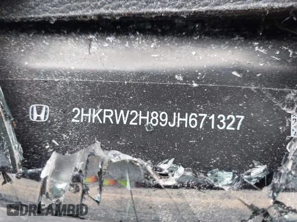 2018 Honda CR-V EX-L z VIN 2HKRW2H89JH671327, wystawiony jako IAAI lot #42159441 z przebiegiem Nie podano mil oraz . Historia ofert i sprzedaży dostępna na DreamBid. Obrazek 9.