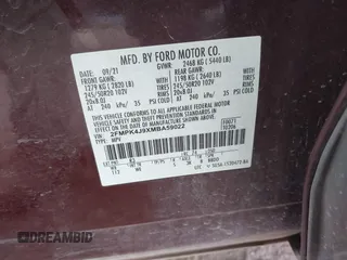 2021 Ford Edge SEL z VIN 2FMPK4J9XMBA59022, wystawiony jako IAAI lot #40596255 z przebiegiem 41 770 mil mil oraz . Historia ofert i sprzedaży dostępna na DreamBid. Obrazek 9.