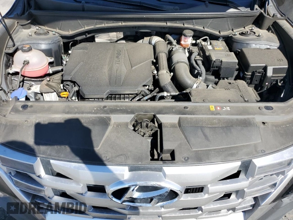 2022 Hyundai Santa Cruz SEL Premium z VIN 5NTJDDAF5NH039391, wystawiony jako Copart lot #47832105 z przebiegiem 37 226 mil mil oraz Szkoda całkowita • Salvage title. Historia ofert i sprzedaży dostępna na DreamBid. Obrazek 13.