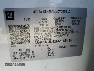 2021 GMC Acadia SLT z VIN 1GKKNUL41MZ165416, wystawiony jako Copart lot #49061435 z przebiegiem 63 646 mil mil oraz Szkoda całkowita • Salvage title. Historia ofert i sprzedaży dostępna na DreamBid. Obrazek 14.