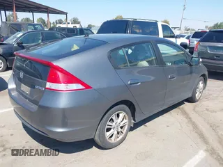 2010 Honda Insight EX with VIN JHMZE2H72AS015870, listed as a IAAI auction lot 42762384 with 58,121 mi miles and . Bid and sale history available at DreamBid. Image 4.