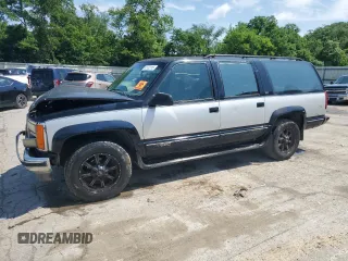 1993 GMC Suburban with VIN 1GKFK16K3PJ739522, listed as a Copart auction lot 61732115 with 296,776 mi miles and Salvage title. Bid and sale history available at DreamBid. Image 1.