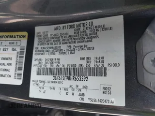 2017 Lincoln MKZ Reserve z VIN 3LN6L5E98HR653592, wystawiony jako IAAI lot #42531248 z przebiegiem 114 188 mil mil oraz . Historia ofert i sprzedaży dostępna na DreamBid. Obrazek 9.
