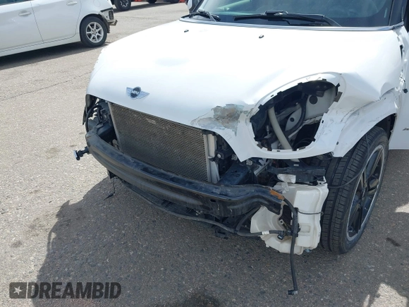 2016 MINI Countryman S with VIN WMWZC5C57GWU22015, listed as a IAAI auction lot 41806547 with 65,124 mi miles and . Bid and sale history available at DreamBid. Image 6.