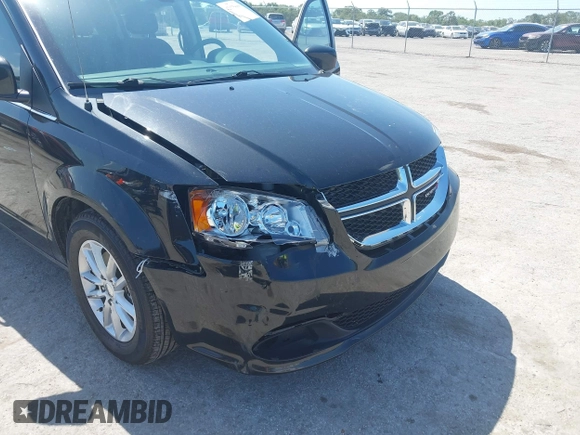 2019 Dodge Grand Caravan SXT with VIN 2C4RDGCG5KR739144, listed as a IAAI auction lot 42175888 with 43,577 mi miles and . Bid and sale history available at DreamBid. Image 6.