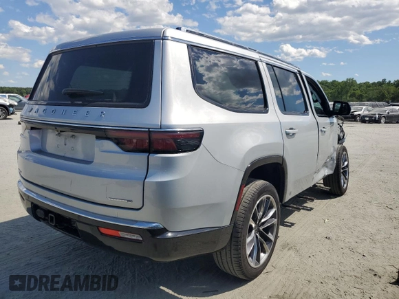 2023 Jeep Wagoneer Series II Carbide with VIN 1C4SJVBP1PS561660, listed as a Copart auction lot 57832565 with 17,715 mi miles and Salvage title. Bid and sale history available at DreamBid. Image 3.
