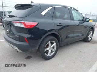 2021 Ford Escape SE z VIN 1FMCU9G6XMUA27362, wystawiony jako IAAI lot #42438771 z przebiegiem 36 040 mil mil oraz . Historia ofert i sprzedaży dostępna na DreamBid. Obrazek 4.