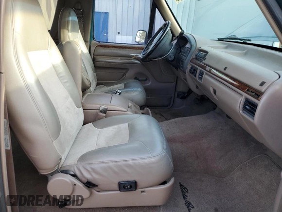 1996 Ford Bronco Custom with VIN 1FMEU15H4TLB59116, listed as a Copart auction lot 52989015 with 210,464 mi miles and Salvage title. Bid and sale history available at DreamBid. Image 7.