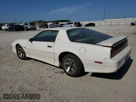 1989 Pontiac Firebird z VIN 1G2FS21S4KL260438, wystawiony jako Copart lot #57420155 z przebiegiem 132 101 mil mil oraz Czysty tytuł • Clean title. Historia ofert i sprzedaży dostępna na DreamBid. Obrazek 3.