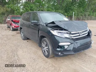 2018 Honda Pilot EX-L with VIN 5FNYF6H53JB002056, listed as a IAAI auction lot 42241215 with 144,959 mi miles and . Bid and sale history available at DreamBid. Image 1.