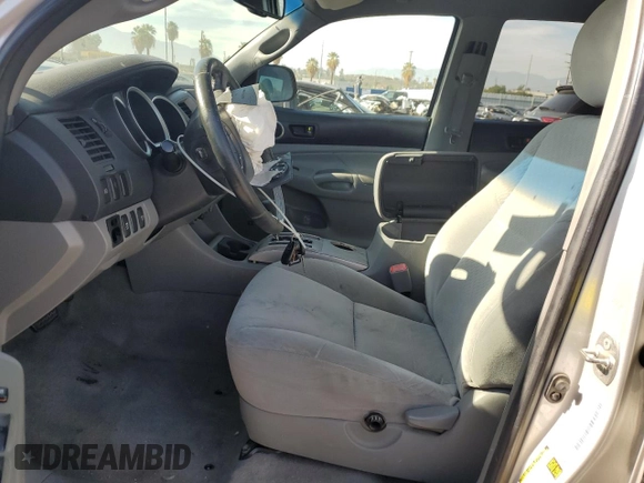 2010 Toyota Tacoma PreRunner with VIN 3TMKU4HN4AM025390, listed as a Copart auction lot 50242825 with 450,676 mi miles and Salvage title. Bid and sale history available at DreamBid. Image 7.