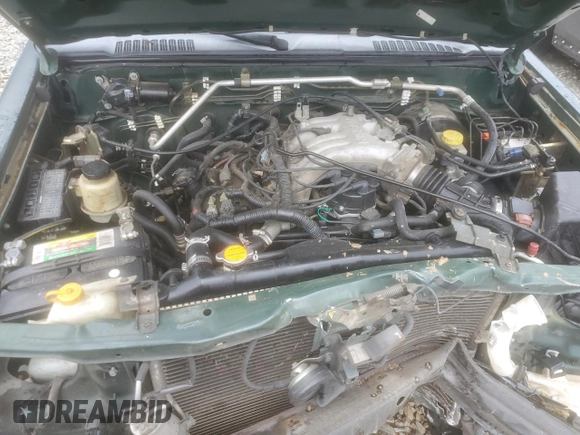2002 Nissan Xterra XE z VIN 5N1ED28T92C593374, wystawiony jako Copart lot #55596945 z przebiegiem 221 160 mil mil oraz Szkoda całkowita • Salvage title. Historia ofert i sprzedaży dostępna na DreamBid. Obrazek 12.