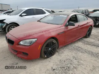 2013 BMW 6 Series 650i with VIN WBA6B2C50DDG66703, listed as a Copart auction lot 82225824 with 199,076 mi miles and Salvage Title. Bid and sale history available at DreamBid. Image 1.