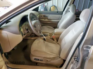 2002 Mercury Sable GS z VIN 1MEFM50U02G652804, wystawiony jako Copart lot #57405035 z przebiegiem 264 042 mil mil oraz Szkody całkowita. Historia ofert i sprzedaży dostępna na DreamBid. Obrazek 7.