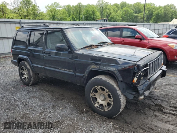 2000 Jeep Cherokee Classic with VIN 1J4FF58S8YL119611, listed as a Copart auction lot 57255685 with 148,908 mi miles and Clean title. Bid and sale history available at DreamBid. Image 4.