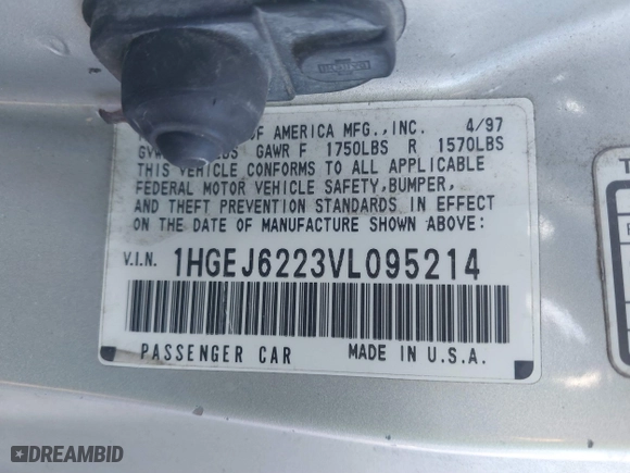 1997 Honda Civic DX with VIN 1HGEJ6223VL095214, listed as a IAAI auction lot 41560717 with 257,409 mi miles. Bid and sale history available at carsss.com. Image 9.