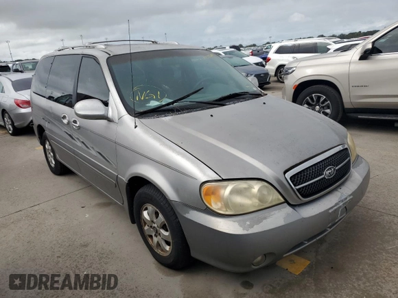 2004 Kia Sedona LX with VIN KNDUP131446570061, listed as a Copart auction lot 74222344 with 0 mi miles and Salvage Title. Bid and sale history available at carsss.com. Image 4.