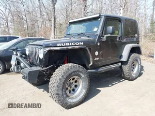2004 Jeep Wrangler Rubicon with VIN 1J4FA69S64P789308, listed as a IAAI auction lot 41714489 with 186,302 mi miles. Bid and sale history available at carsss.com. Image 17.
