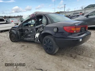 2000 Saturn SL with VIN 1G8ZK5274YZ145472, listed as a Copart auction lot 42871945 with Not provided miles and Salvage title. Bid and sale history available at DreamBid. Image 2.