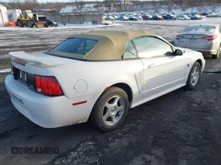 2004 Ford Mustang Deluxe with VIN 1FAFP446X4F214949, listed as a IAAI auction lot 41386560 with 172,410 mi miles. Bid and sale history available at carsss.com. Image 4.