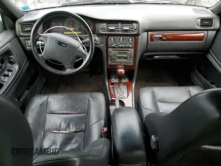 2000 Volvo S70 z VIN YV1LS56D4Y2658316, wystawiony jako Copart lot #81021544 z przebiegiem 147 925 mil mil oraz Szkody całkowita. Historia ofert i sprzedaży dostępna na DreamBid. Obrazek 8.