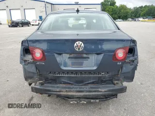 2009 Volkswagen Jetta SE with VIN 3VWRZ71K59M055735, listed as a Copart auction lot 60202485 with 160,196 mi miles and Salvage title. Bid and sale history available at DreamBid. Image 6.