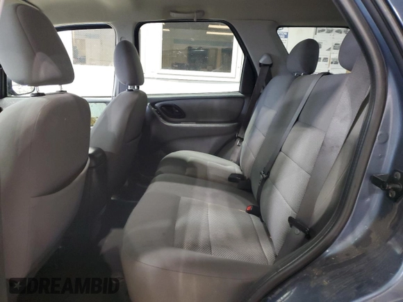 2005 Ford Escape XLT z VIN 1FMYU93145KB29172, wystawiony jako Copart lot #57724475 z przebiegiem 146 236 mil mil oraz Szkoda całkowita • Salvage title. Historia ofert i sprzedaży dostępna na DreamBid. Obrazek 11.