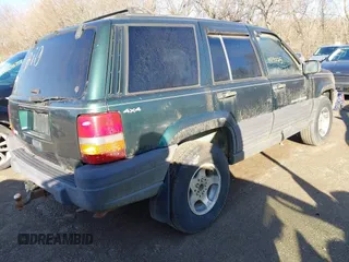 1997 Jeep Grand Cherokee Laredo with VIN 1J4GZ58S2VC605385, listed as a IAAI auction lot 41797715 with 169,996 mi miles and . Bid and sale history available at DreamBid. Image 4.