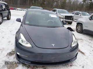 2023 Tesla Model 3 Long Range with VIN 5YJ3E1EBXPF708122, listed as a IAAI auction lot 41185314 with 27,765 mi miles and . Bid and sale history available at DreamBid. Image 12.