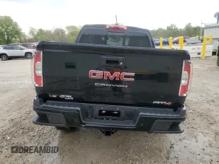 2021 GMC Canyon 4WD AT4 z VIN 1GTG6FEN9M1192443, wystawiony jako Copart lot #54955745 z przebiegiem 1544 mil mil oraz Tytuł czysty. Historia ofert i sprzedaży dostępna na DreamBid. Obrazek 6.