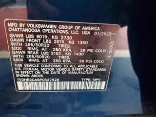 2023 Volkswagen Atlas SE z VIN 1V2HR2CA5PC527628, wystawiony jako IAAI lot #42569146 z przebiegiem 27 424 mil mil oraz . Historia ofert i sprzedaży dostępna na DreamBid. Obrazek 2.