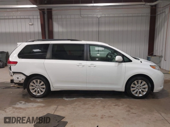 2013 Toyota Sienna LE with VIN 5TDJK3DC2DS049479, listed as a IAAI auction lot 41322671 with 108,436 mi miles and . Bid and sale history available at DreamBid. Image 14.