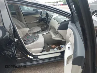 2011 Toyota Corolla L with VIN JTDBU4EE2B9158833, listed as a IAAI auction lot 42120661 with Not Provided miles. Bid and sale history available at carsss.com. Image 5.