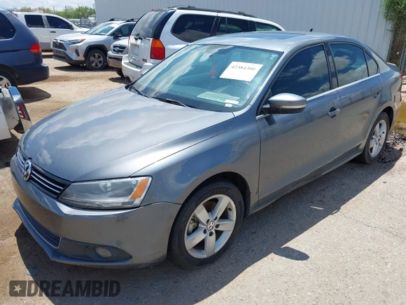 2012 Volkswagen Jetta TDI w/Premium with VIN 3VWLL7AJ1CM307485, listed as a IAAI auction lot 42384300 with 118,958 mi miles and . Bid and sale history available at DreamBid. Image 2.
