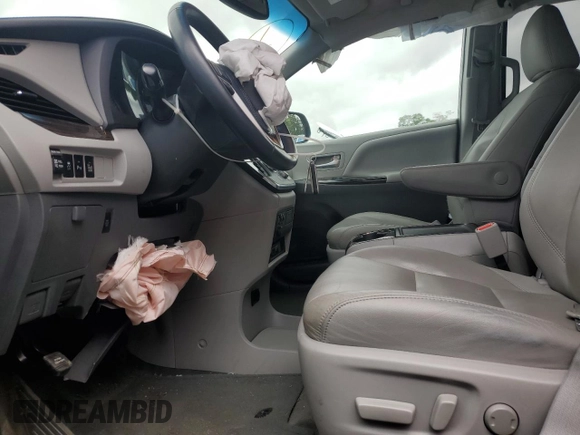 2015 Toyota Sienna XLE с VIN 5TDYK3DC0FS630013, выставлен на аукционе Copart как лот 60044955 с пробегом 124 063 миль миль и Списание • Salvage title. История ставок и продаж доступна на DreamBid. Изображение 7.