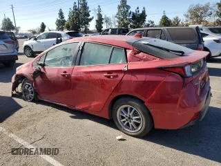 2021 Toyota Prius L Eco with VIN JTDKAMFUXM3148409, listed as a Copart auction lot 83393084 with 72,241 mi miles and Clean Title. Bid and sale history available at carsss.com. Image 2.