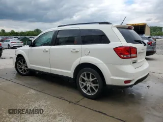 2014 Dodge Journey R/T with VIN 3C4PDCEG0ET309861, listed as a Copart auction lot 55318185 with 185,526 mi miles and Salvage title. Bid and sale history available at DreamBid. Image 2.