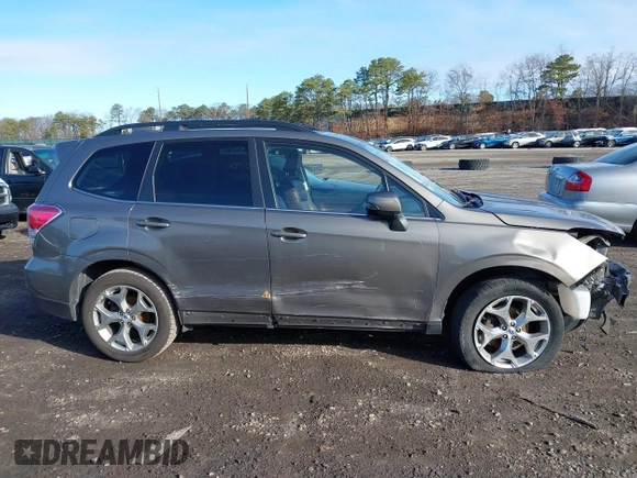 2017 Subaru Forester Touring z VIN JF2SJAWC9HH507636, wystawiony jako IAAI lot #41801988 z przebiegiem 32 030 mil mil oraz . Historia ofert i sprzedaży dostępna na DreamBid. Obrazek 13.