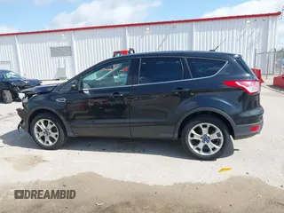 2013 Ford Escape SEL with VIN 1FMCU9HX1DUB97939, listed as a IAAI auction lot 42293561 with 196,951 mi miles and . Bid and sale history available at DreamBid. Image 15.
