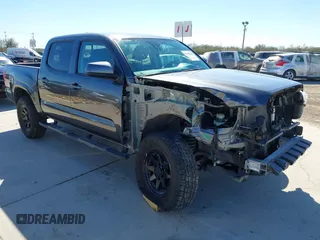 2023 Toyota Tacoma 4WD SR with VIN 3TYCZ5AN1PT146719, listed as a IAAI auction lot 41406963 with 19,735 mi miles. Bid and sale history available at carsss.com. Image 1.