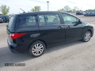2012 Mazda 5 Sport with VIN JM1CW2BL3C0109930, listed as a IAAI auction lot 42197142 with 154,913 mi miles. Bid and sale history available at carsss.com. Image 4.